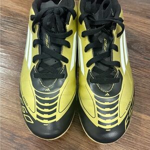 Adidas F50 Soccer Cleats in Black and Gold